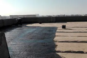 قیرگونی حرفه‌ای در تهران با عایق نوین: بهترین انتخاب برای ایمن‌سازی ساختمان شما