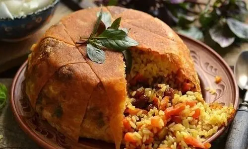 طرز تهیه شاه پلو مخلوط؛ مخصوص عاشقان ته‌دیگ | فوت و فن‌های خوشمزه شدن شاه پلو مخلوط